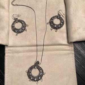 Silver necklace and earrings